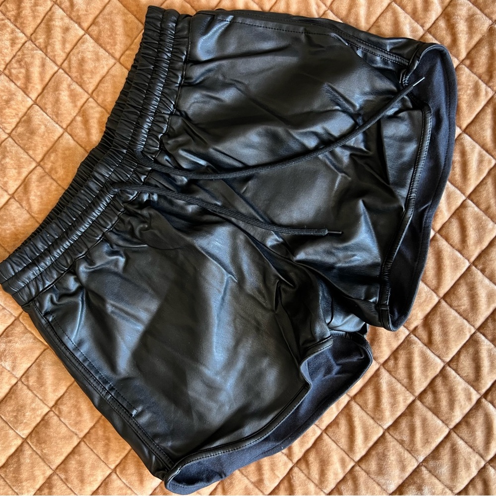 black faux leather shorts
